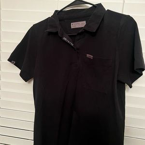 Nala (limited edition) polo with front pocket.